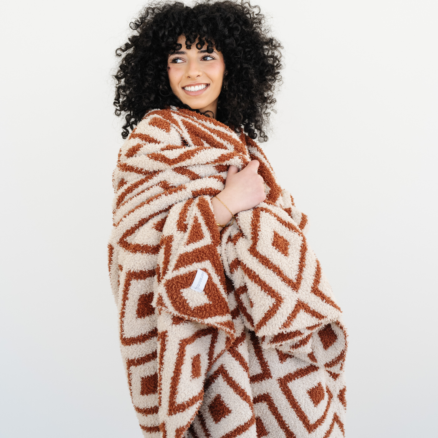Woman wrapped in Khmer double layer bamboni throw blanket. 