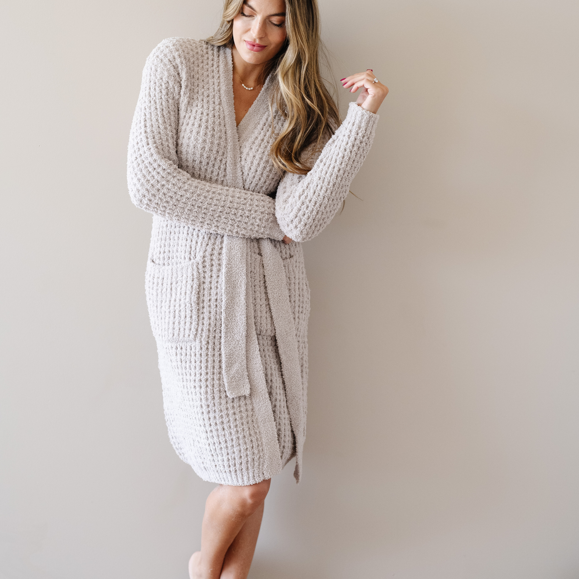 Woman wearing a Oatmeal Waffle Knit Robe. 