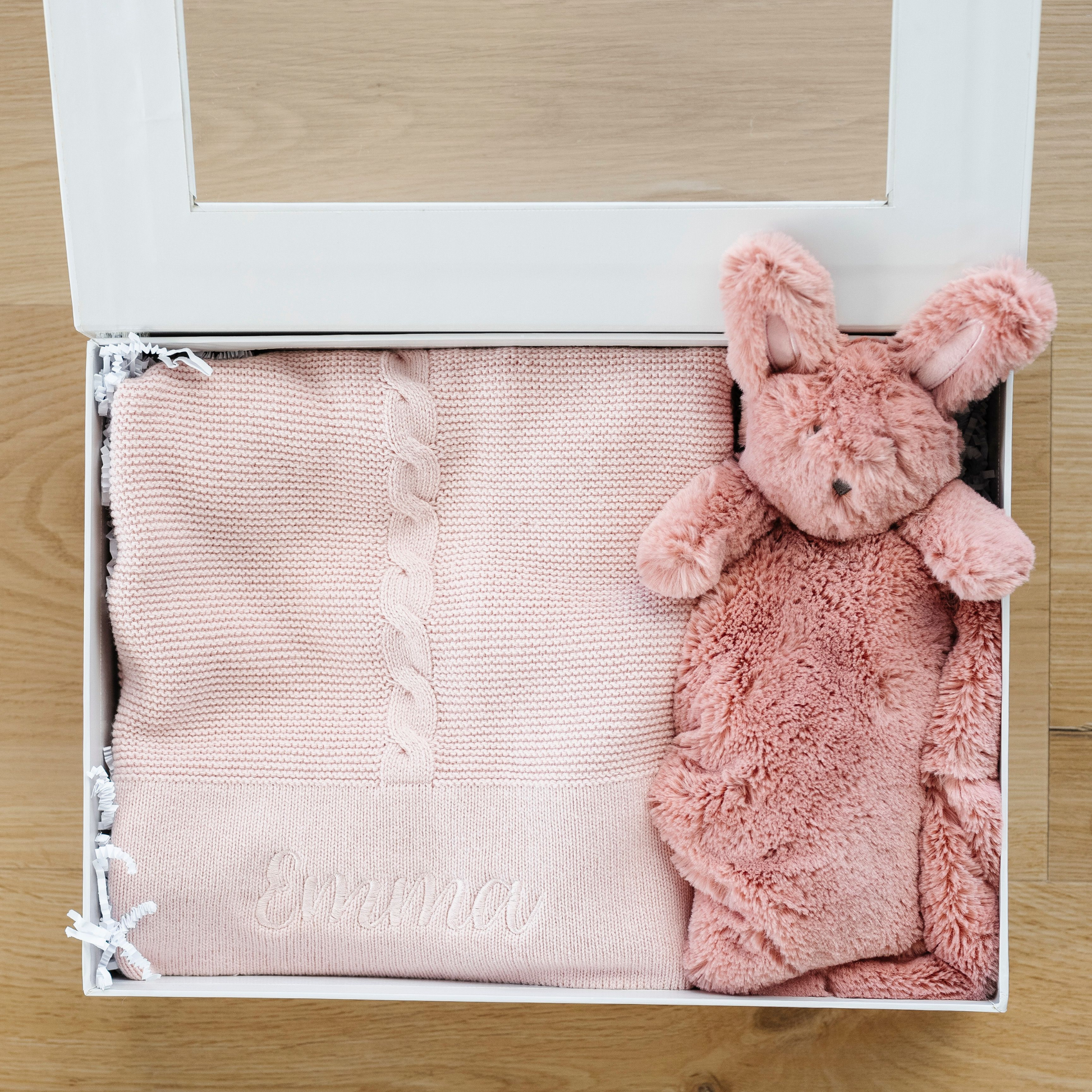 Beautiful baby gift box with timeless heirloom cotton knit baby blanket and stuffed animal lovey. 
