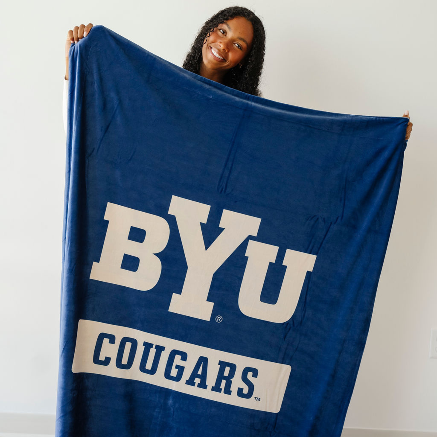 UNIVERSITY MINKY STRETCH BLANKETS