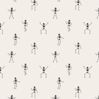 A repeating pattern of small black skeleton figures on a warm off-white background.