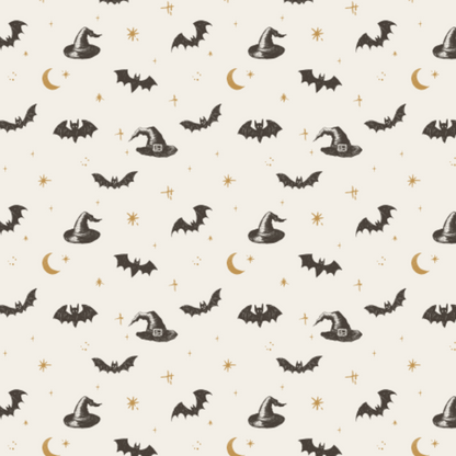 A repeating Halloween-themed pattern featuring black bats, witch hats, crescent moons, and small gold stars on a warm cream background.