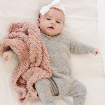Adorable baby with soft and tiny Sunkissed RIBBED BAMBONI MINI BLANKETS - Saranoni